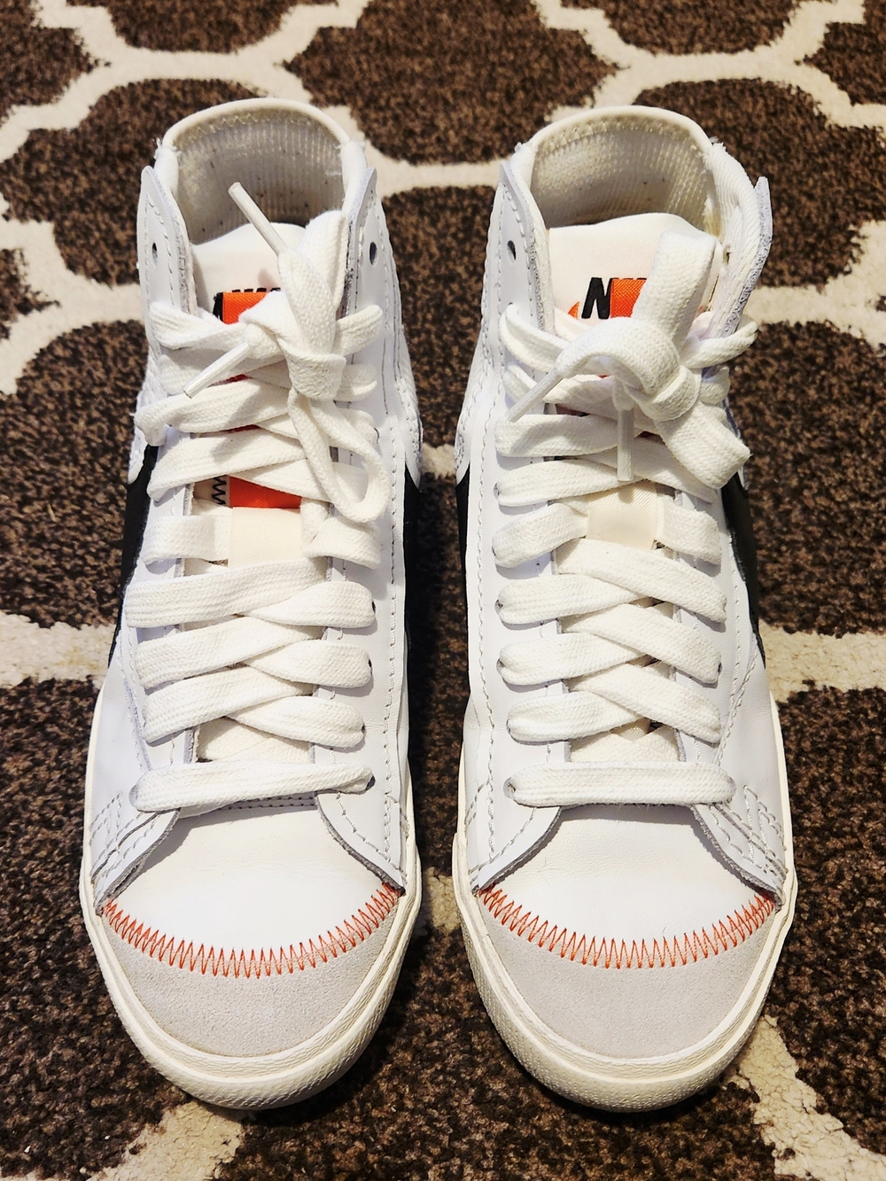 Nike Kids' White High-Top Sneakers with Orange Accent